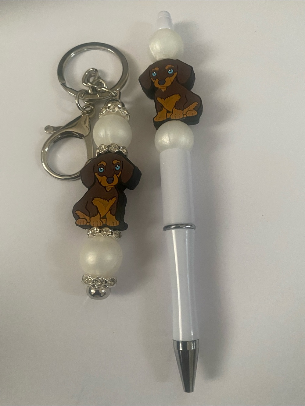 White Dog-Themed Pen & Keychain Set with Brown Dachshund Charm
